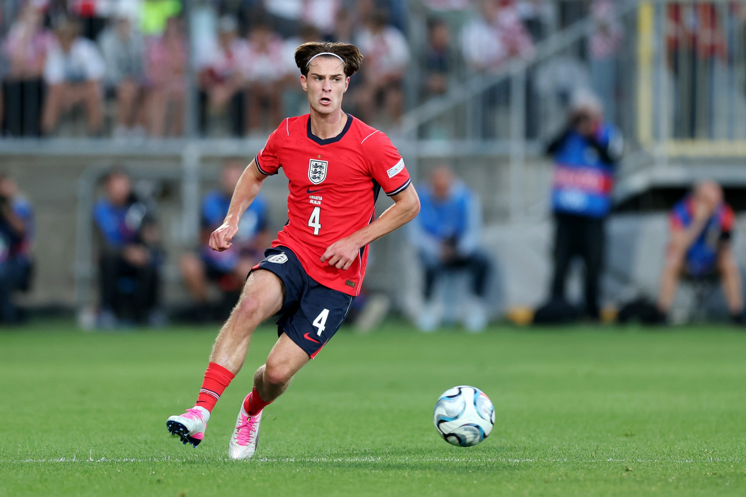 Alex Scott of England passes the ball Alex Scott of England passes the ball